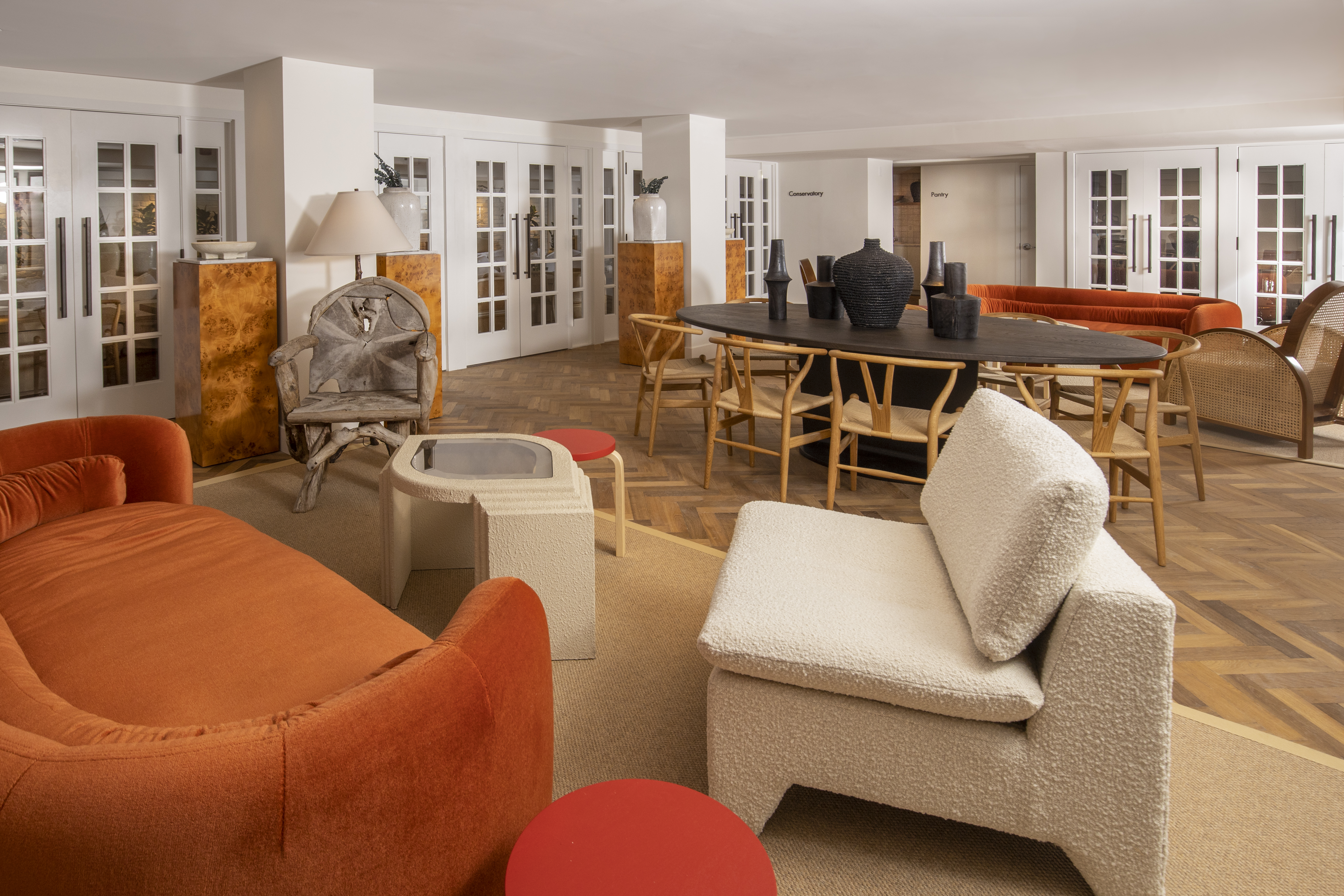 Soft seating and communal tables in the Drawing Room