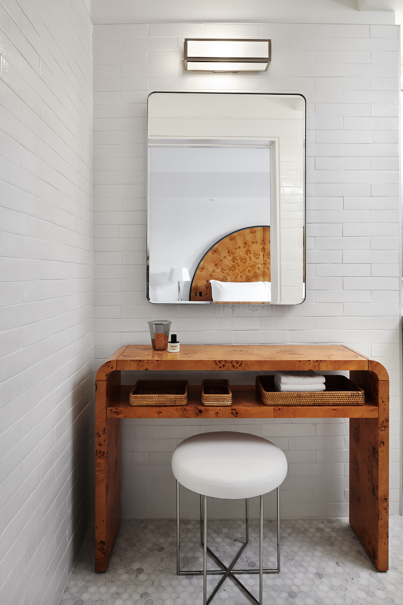 Vanity stand and mirror in bathroom