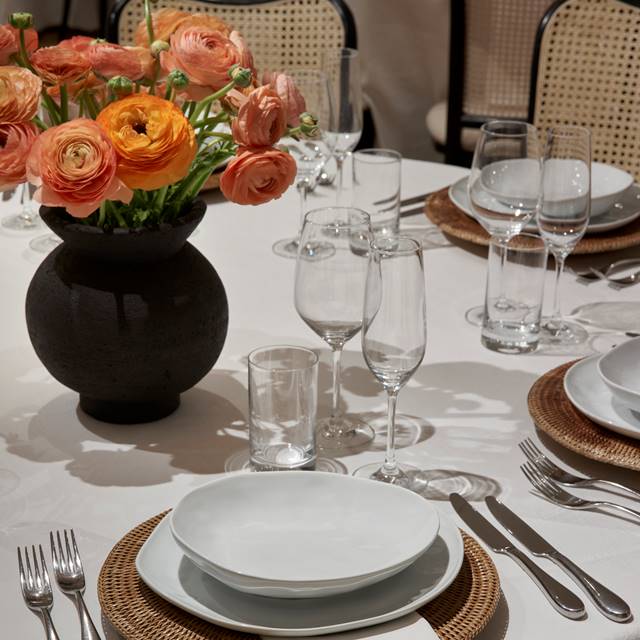 Table setting with florals for dinner