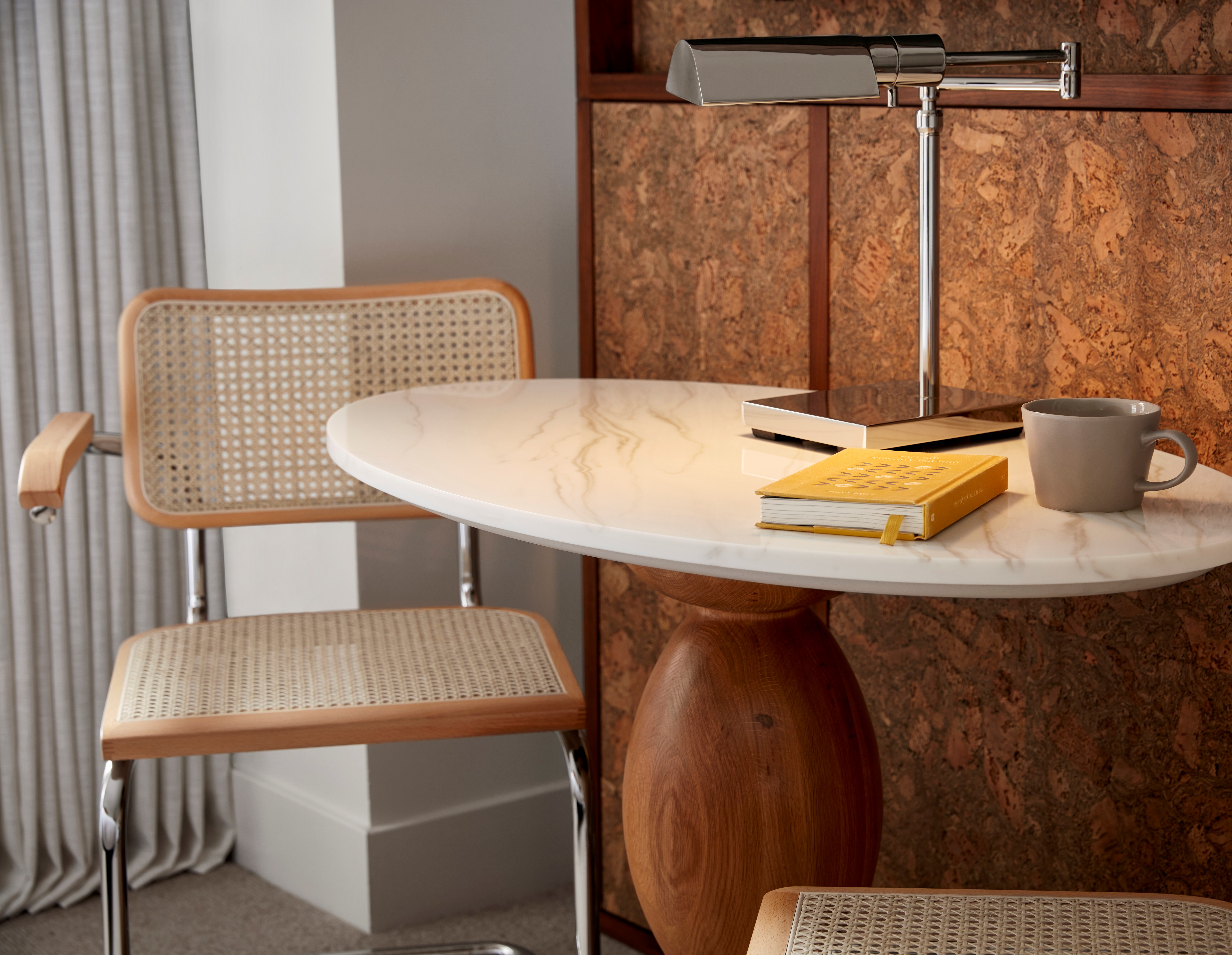 Detail of table, chairs and lamp at a hotel room at Lyle DC.